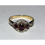 9ct gold ladies Diamond and ruby ring size O