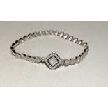 Silver and CZ bracelet with heart clasp