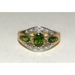 9ct gold Ladies green stone poss emerald and diamond edge ring size O