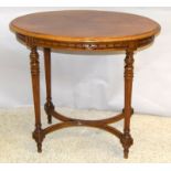 Mahogany oval lamp table on fluted turned legs 73 x 83 x 57cm