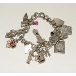 Silver charm bracelet and 13 charms