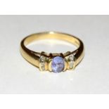 9ct gold ladies Amethyst and diamond shoulder ring size O