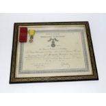 A French Medaille Militaire in its original box with an 1891 dated certificate awarding the medal