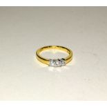 18ct yellow gold three stone diamond ring of 50 points. Size M
