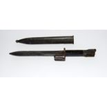 A Belgian FN FAL Type A knife bayonet in its steel scabbard. Blade length 20cms