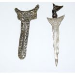 A miniature horn handled Kris in a silver filigree scabbard. Blade length 10cms