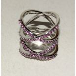 Silver fashion ring with Ruby coloured twist size N