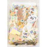 Massive crate of GB & World stamps mainly on paper early issues noted completely unsorted/