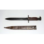 A WW2 Swedish knife bayonet in steel scabbard with a blade length of 21cms