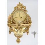 Gilt wall clock with key