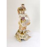 Dersden porcelain figure of a maiden in the form of a candle holder 33cm tall