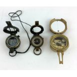 Three compasses including military