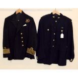 A Dorset Regiment Captains tunic and a Royal Navy Captains tunic with WW1 & WW2 medal ribbons