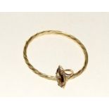 9ct gold ladies bangle and a 9ct gold quartz ring