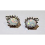 Pair of silver, cz and opal earrings