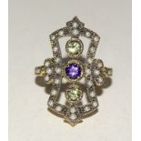9ct yellow gold Art Deco style ring set with Peridot and central amethyst
