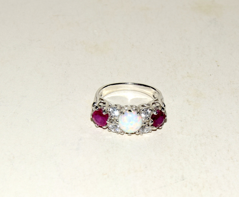 Silver and CZ central opal set ring. Size O