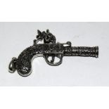 Unusual silver miniature percussion style pistol