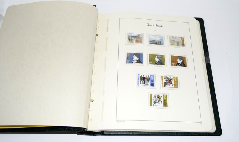 Superb collection of GB Mint Stamps in De-Luxe album with Specially printed pages