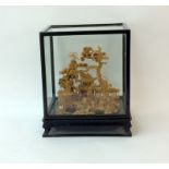 Glass case Chinese cork carving of pagoda with tree and herons 30x22x20cm