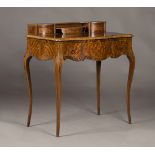 A late 19th/early 20th century Louis XV style walnut and parquetry inlaid lady's writing table,