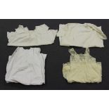 A group of mainly Victorian and Edwardian clothing, including nightdresses, infants' clothes and
