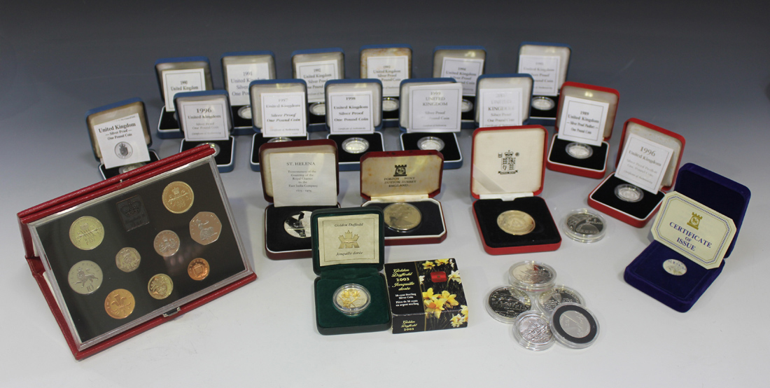 A collection of Royal Mint United Kingdom proof coinage, comprising two piedfort issue silver one
