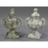 A pair of 20th century white painted moulded composition garden urns and covers, the circular bodies