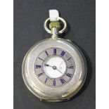 A silver keyless wind half-hunting cased gentleman's pocket watch with an unsigned jewelled