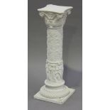 A 20th century cast composition pedestal, the acanthus leaf capital above a foliate stem decorated