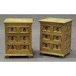 A pair of modern pine bedside chests of three drawers, on bun feet, height 68cm, width 53cm, depth