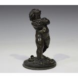 A 19th century Continental brown patinated cast bronze figure of a putto performing tricks with