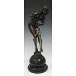 After Colinet - a modern Art Deco style cast bronze figure of a dancing female nude, bearing