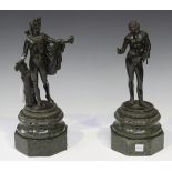 After the antique - a pair of 19th century Continental dark brown patinated cast bronze figures of