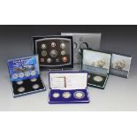 Four Royal Mint United Kingdom proof sets, comprising Millennium ten coin set 2000, three coin