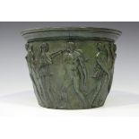 An early 20th century green patinated cast bronze jardinière, possibly American, decorated in relief