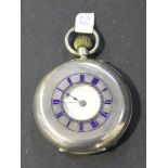 A silver keyless wind half-hunting cased lady's fob watch, the unsigned jewelled lever movement