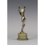 Stefan Dakon - an Art Deco silvered and gilt cast bronze figure of a dancing girl holding a
