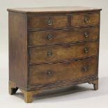 A Victorian mahogany bowfront chest of two short and three long drawers, on bracket feet, height