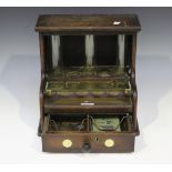 An early 20th century oak cased cash till, bearing maker's mark 'Quiktil Patent No. 266, 886.26',