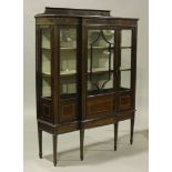 An Edwardian mahogany breakfront display cabinet with overall crossbanded borders and boxwood