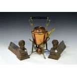 A Continental Art Nouveau copper and brass kettle on heater stand with stylized foliate handle and