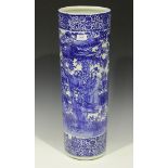 An early 20th century Japanese blue and white transfer printed stick stand of cylindrical form,