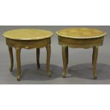 A pair of 20th century French oak circular occasional tables, on cabriole legs, height 59cm,
