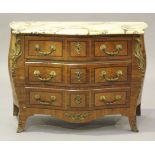 An early 20th century Louis XV style kingwood bombé commode, the serpentine white marble top above