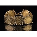 Seven Saudi Arabia trade coinage gold guineas, mounted as a bracelet, fitted with a 9ct gold