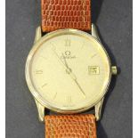 An Omega Quartz 9ct gold circular cased gentleman's wristwatch, the interior case back numbered '