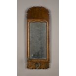 A George I walnut fretwork framed girandole wall mirror of small proportions, the arched pediment