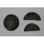 A Henry III long cross penny and two Henry III short cross cut halfpennies.