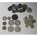 A collection of British and foreign coins, tokens and medallions, including two George III crowns (